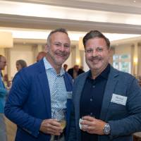 Michael Losey and Christopher Zimmerman posing together for photo